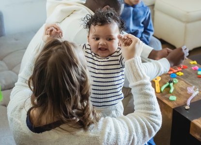 baby and mum playing