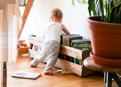 baby choosing a book