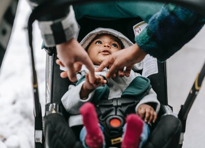 baby in pushchair