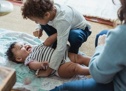 baby playing on the floor