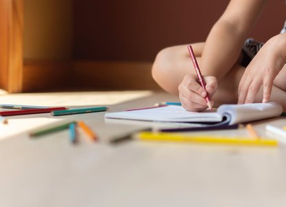 child writing poem.jpeg