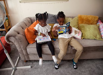 Brother and sister reading