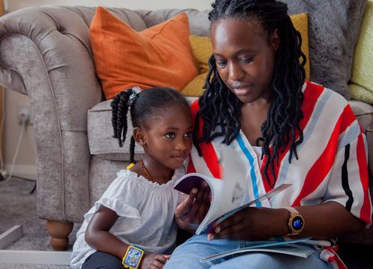 Mother and daughter reading