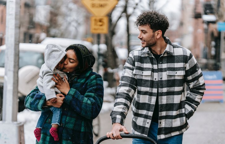 parents and baby outside