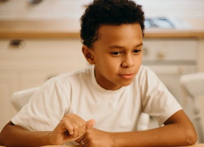 Child reading recipe