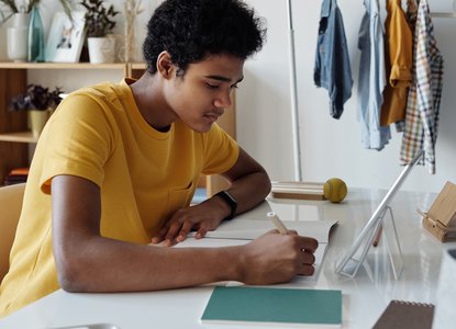 Teenager writing