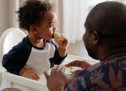 talking to baby eating
