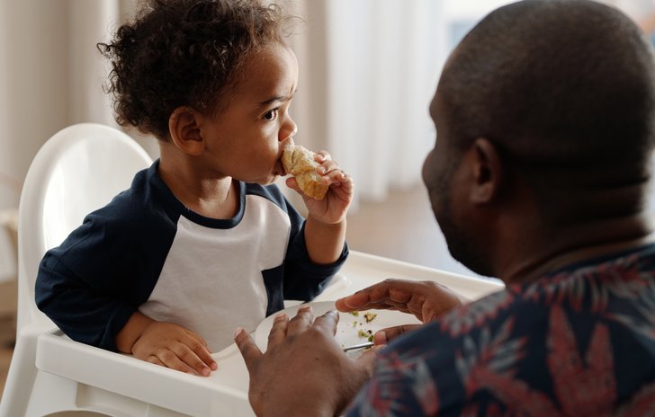 talking to baby eating