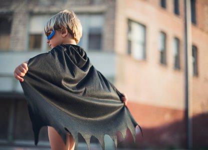 Boy dressed as superhero