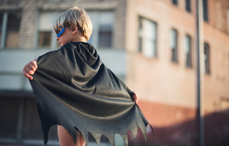Boy dressed as superhero